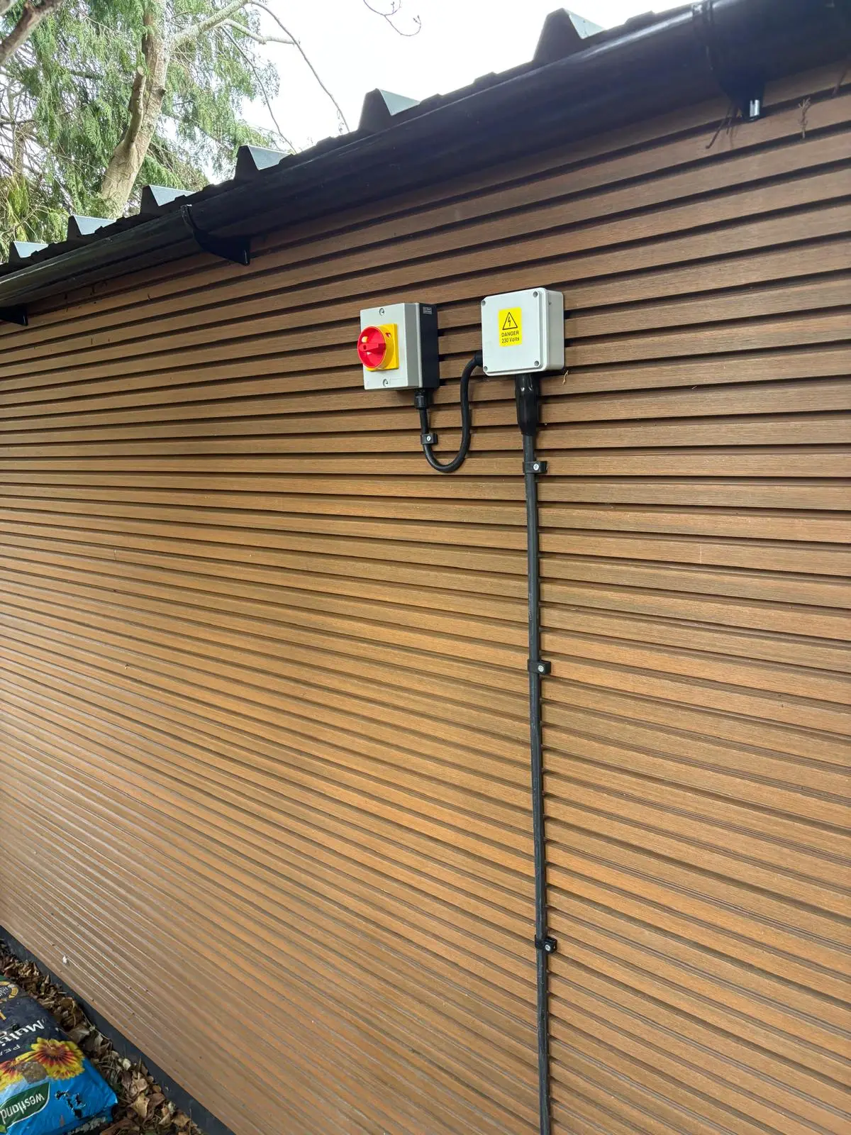 Air conditioning isolator installed by Bring it Ohm Electrical Solutions in Walton-on-Thames, next to Hersham