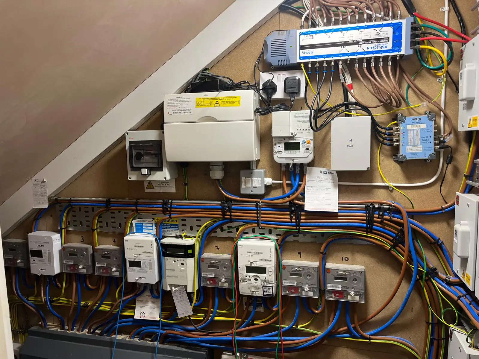 Consumer unit replacement and EICR for a block of flats in Chertsey, carried out by Bring it Ohm Electrical Solutions, electrician in Weybridge