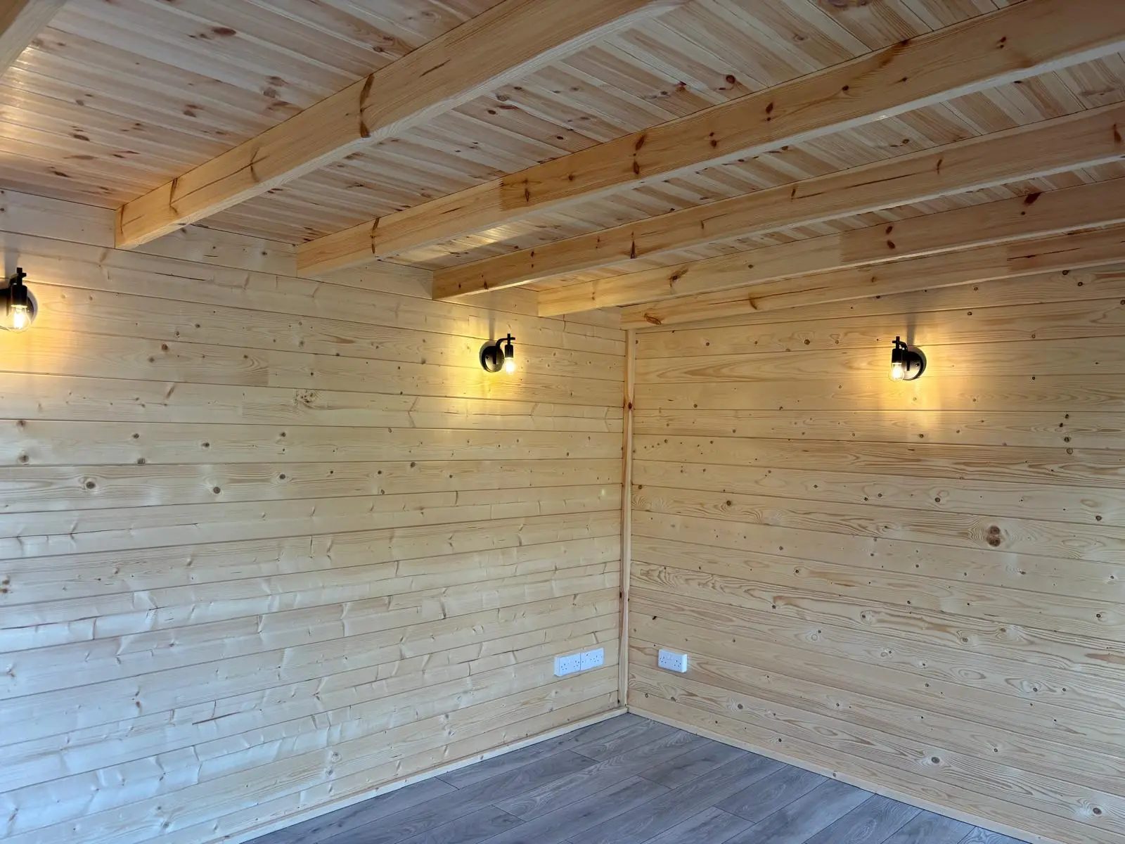 Garden room wiring project in Thames Ditton showing wall lights and a socket circuit